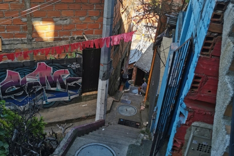 Medellín: Comuna 13 onze geschiedenis, transformatie en realidad