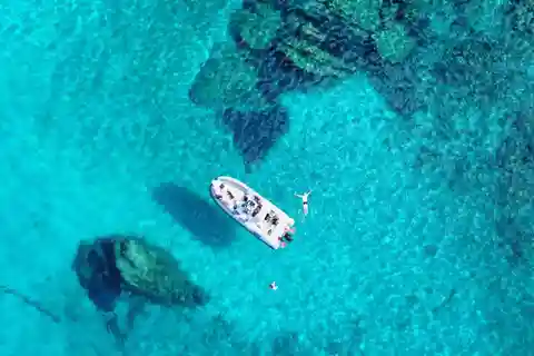 From Olbia: Dinghy Tour with Snorkeling to Tavolara Island