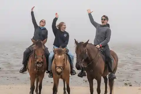 Horseback riding trough the beach GROUP - PDT