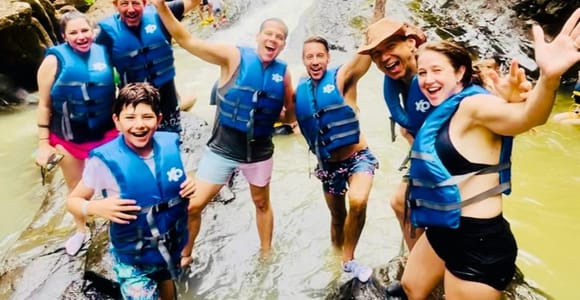 San Juan: Rainforest Waterslides & Beach Tour with Transport
