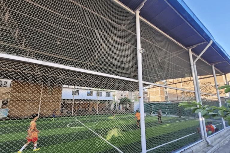 Local Football Game with Young Nepali Youths