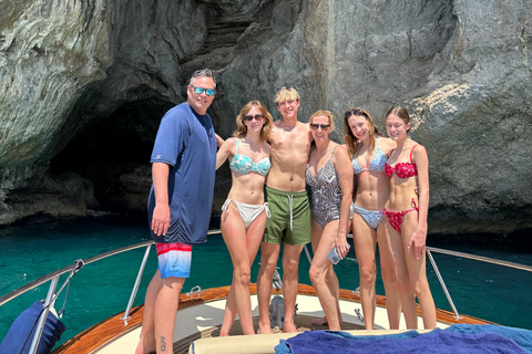 Capri Boat Tour with Caves, Swimming, Aperitif and Champagne From Capri: PRIVATE Capri Boat Tour