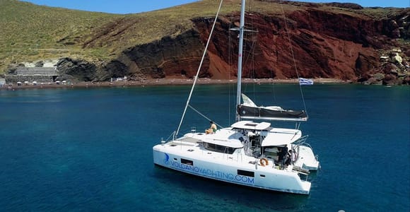 Santorini: Sunset Cruise with Swim Stops, Dinner, and Drinks