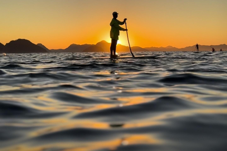 See the Sunrise in Copacabana from a Stand Up Paddleboard with Photos