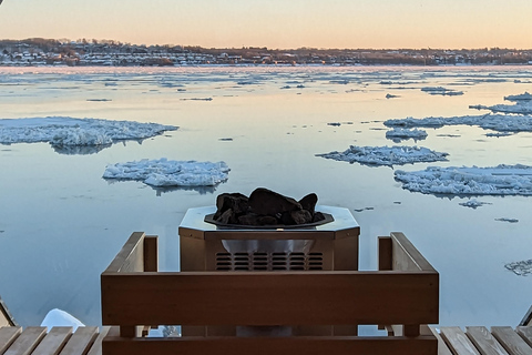 Ciudad de Quebec: Experiencia en canoa de hielo al atardecer con saunaPiragua sobre hielo al atardecer con chocolate caliente y sauna