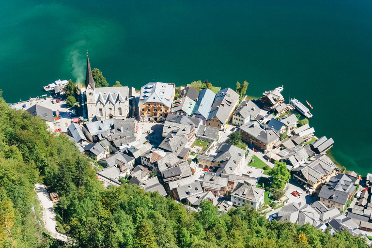 Vienna: escursione di un giorno ad Hallstatt e alle vette alpine con ascensore SkywalkEscursione di un giorno da un punto di incontro centrale