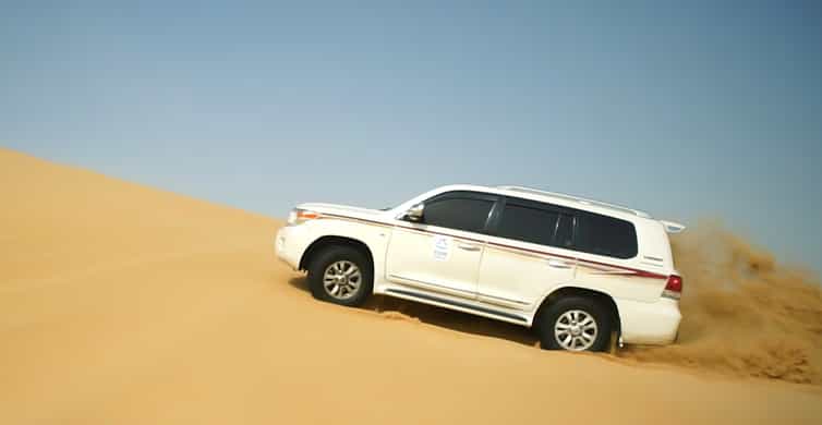 Doha: Dune Safari, Camel Ride, & Sandboarding with Transfer photo 11