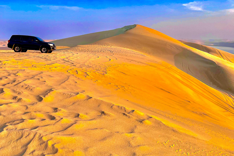 Från Doha: Safari i soluppgång eller solnedgång med sandboarding