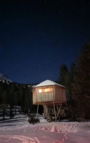 Visit Grau Roig 1 night Piolet Cabin Experience with Snowmobile in La Cerdanya, Spain