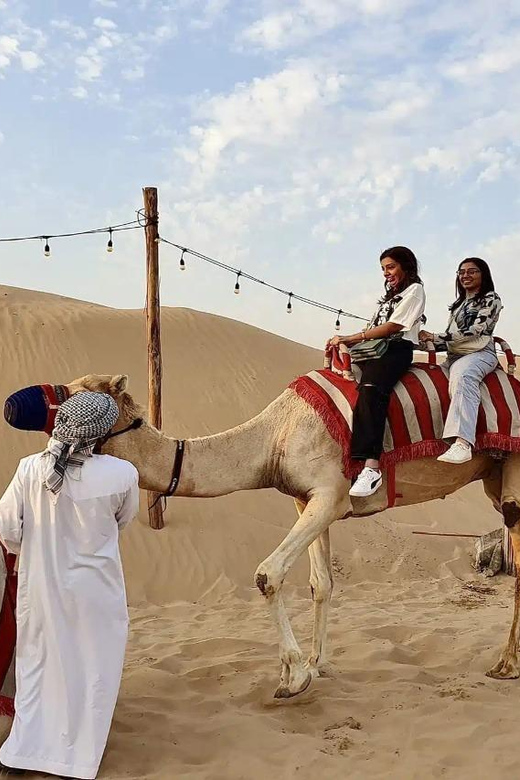 Dubai:Desert Safaris, Camel Ride, Sandboard, Shows & Dinner | GetYourGuide