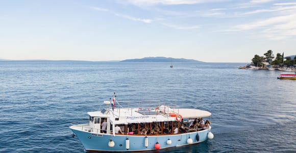 Opatija: Bootstour zur Insel Cres mit Mittagessen und Getränken