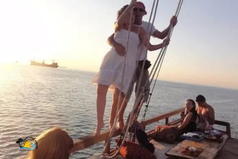 Zanzibar: Mnemba Dolphins Tour and Sunset Dhow Cruise Hotel Transfers within Nungwi and Kendwa