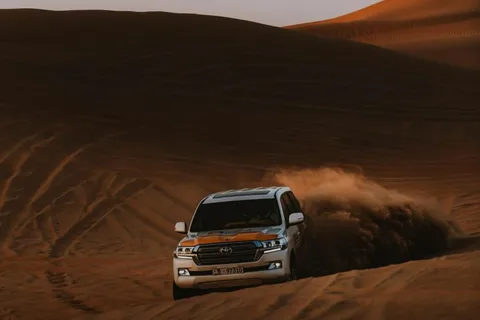 Da Doha: Safari notturno nel deserto con osservazione delle stelle e giro in cammello