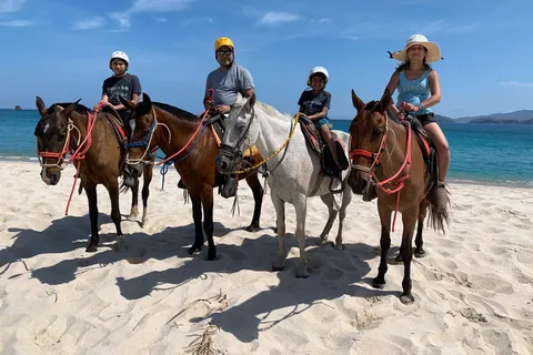 Horseback riding on the beach
