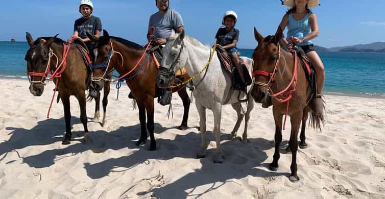 Horseback riding on the beach