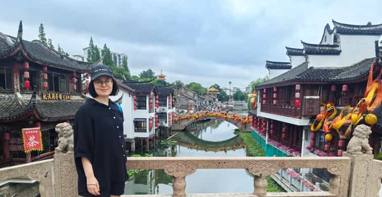 Ancient Water Town + Yu Garden + Bund by Bike/Escooter