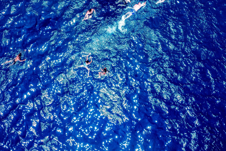 Mykonos: Prywatna wycieczka katamaranem o poranku lub o zachodzie słońca