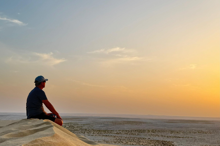 Doha: inland sea Tour With Dune Bashing &Sandboarding fun Doha: safari , camel ride, sandboarding hotel pickup