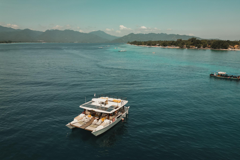 Gili Islands: 4-in-1 Catamaran Snorkeling ExperienceStart from Gili Trawangan – Sunset Cruise w/ Snacks &amp; Dinner