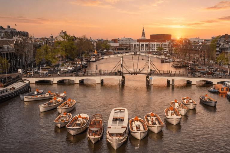 Amsterdam: Evening. (Sunset) Canal Cruise with Bar on Board Central Station Meeting Point without Drinks