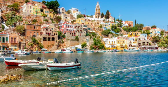 From Rhodes: Symi Island with St. George Bay, Guide & Pickup
