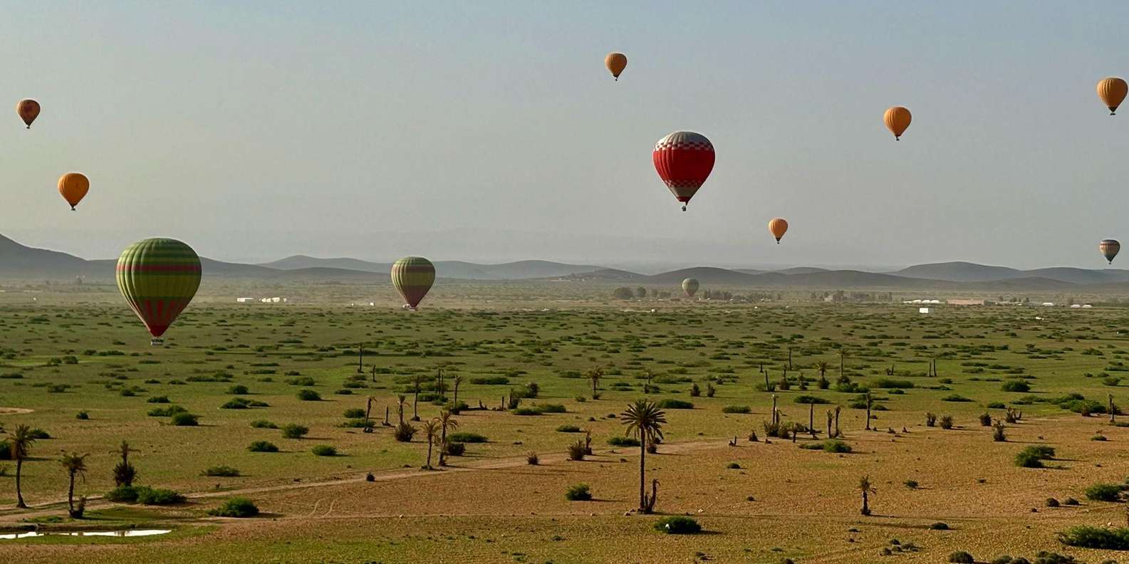 Moroccan breakfast buffet in traditional caidal tent after sunrise balloon flight