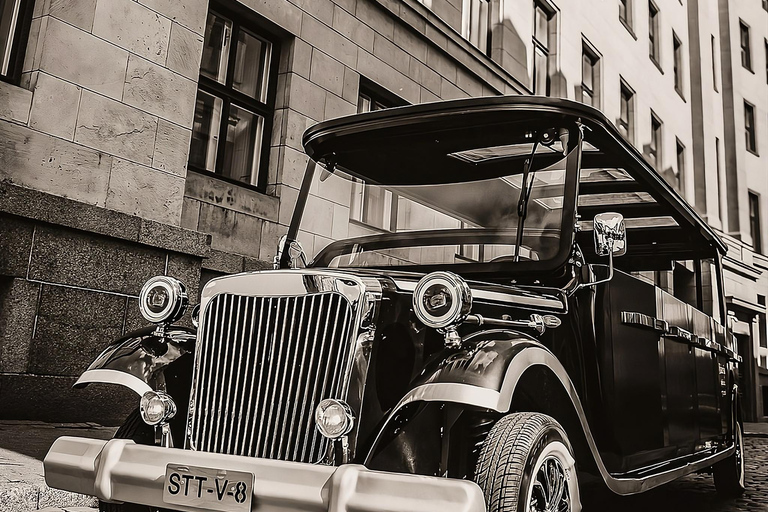 Riga: Electric Car Tour with Wine and Cheese Tasting