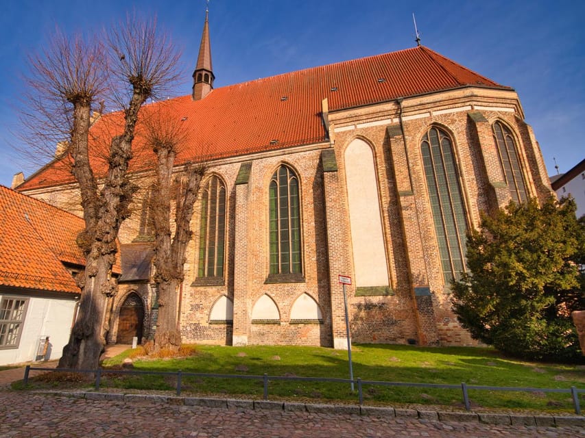 Rostock Old Town Audio Rally by P.I. Sir Peter Morgan | GetYourGuide