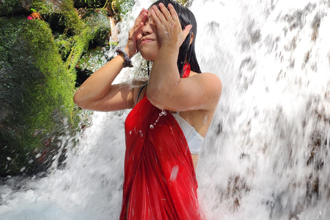 Balinese Purification at holy water temple with Local