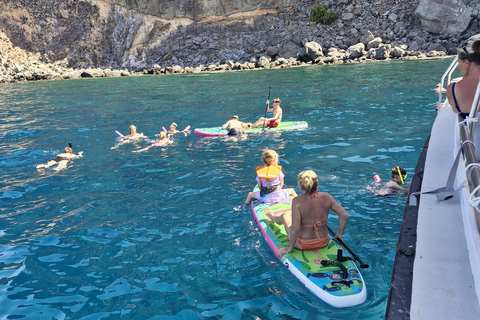 Puerto Rico, Grande Canarie : excursion en bateau, boissons, repas, paddle surf, plongée avec tuba.Profitez du paddle surf et de la plongée avec tuba dans les criques de Grande C