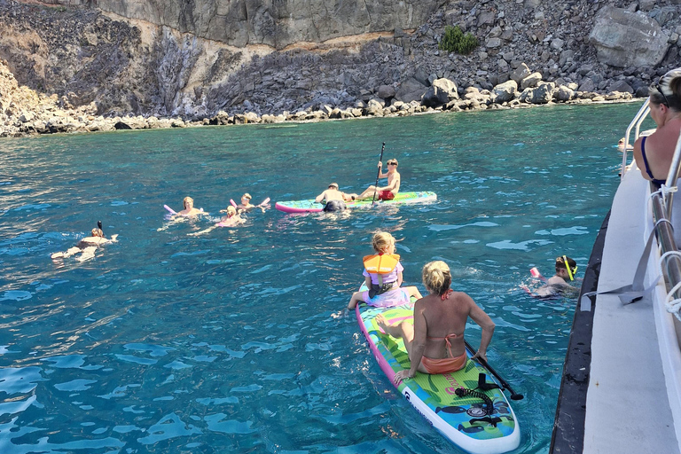 Puerto Rico, Grande Canarie : excursion en bateau, boissons, repas, paddle surf, plongée avec tuba.Profitez du paddle surf et de la plongée avec tuba dans les criques de Grande C