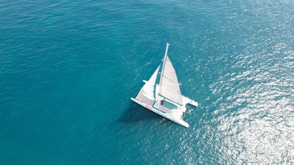 Malaga: Catamaran Sailing Cruise with Swimming & Optional DJ | GetYourGuide