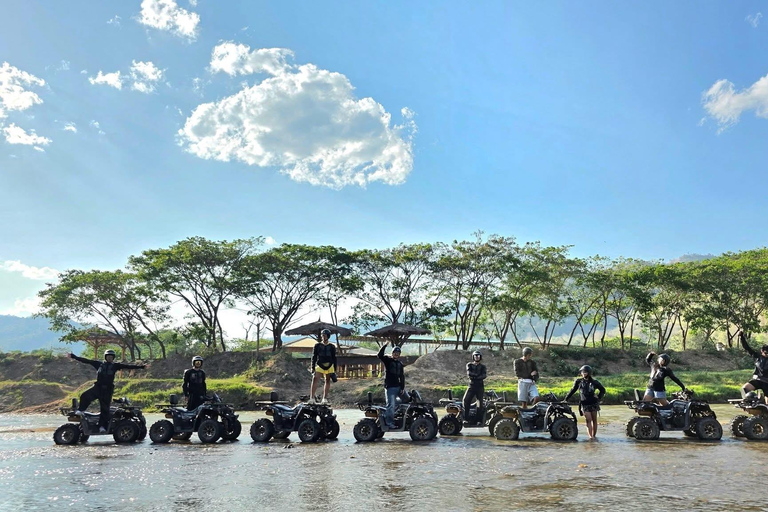 Chiang Mai Adventure: Rafting, ATV & Elephants Experience. Bamboo rafting (4km.) & 1 hrs. ATV.