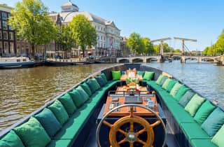 Amsterdam: Geführte offene Bootsfahrt mit unbegrenzten Getränken