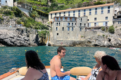 Private Amalfi Coast Boat Tour by boat with Aperitif & snack Private Amalfi Coast Boat Tour by Gozzo with Skipper & Drink