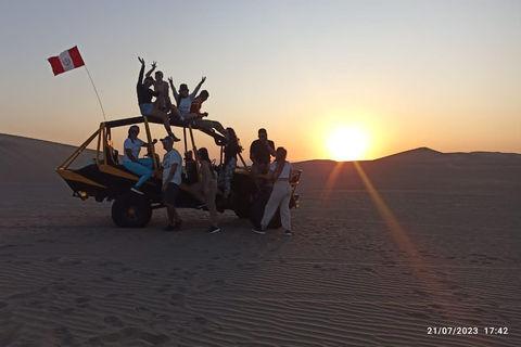 Paseo loco en buggy sandboarding y puesta de sol