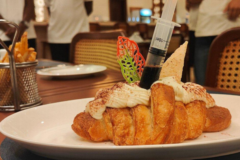 BAO-spel och swahili-kaffeprovning på ZanzibarBAO: Spel- och swahilikaffesmakning på Zanzibar.