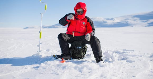 Levi: Ice Fishing Experience with Hot Drink