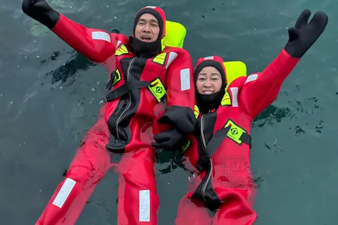 Tromsø: Arctic Fjord Floating in Survival Suit