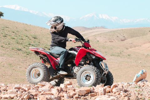 Marrakech: Tour di mezza giornata nel deserto in quad con giro in cammello