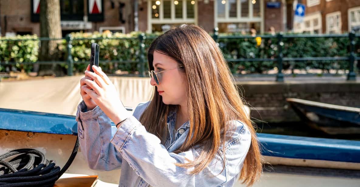 Afbeelding 5 van Amsterdam: Grachtenrondvaart met gids in een open boot langs hoogtepunten