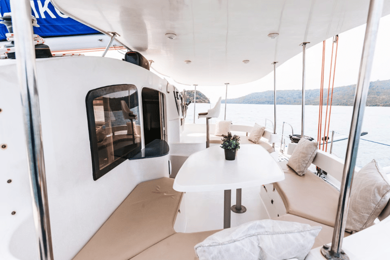 Phuket Catamaran Tour in Coral Island and Sunset Voyage