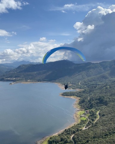 Visit From Bogota Paragliding day in Guatavita in Bogotá