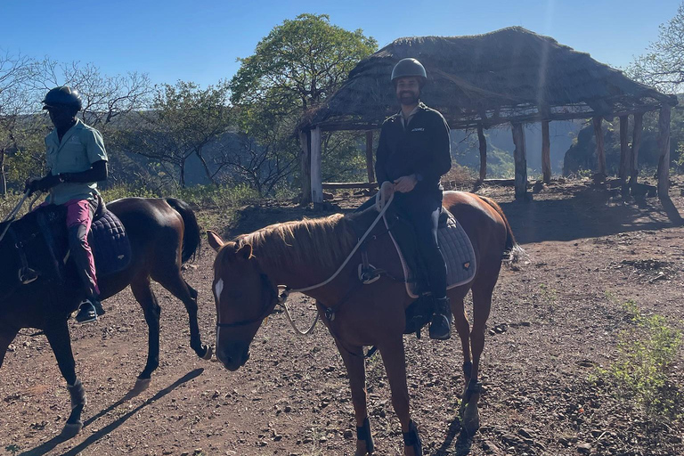 Victoria Falls: African Village Community Tour on Horseback