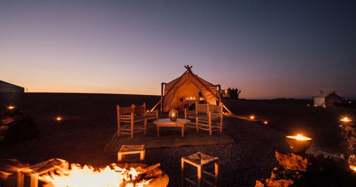 From Marrakech: Agafay Desert Camel Ride And Berber Dinner | GetYourGuide