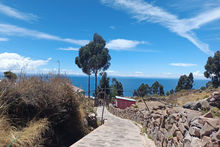 Puno: Uros Floating Islands + Taquile Natural Island (Full Day) with Guide Puno: Floating Uros Islands + Taquile Natural Island (Full Day) with Guide