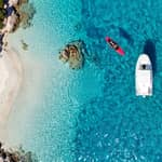 Cagliari: Tour in gommone tramonto soste, spritz pizza