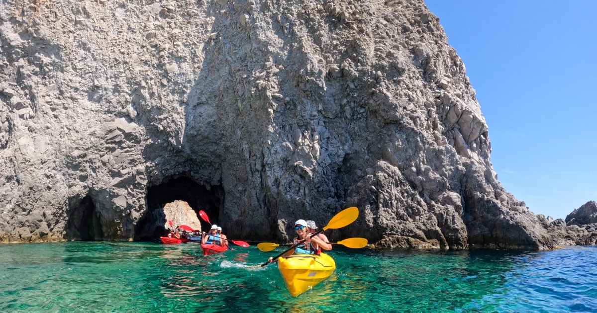 Milos: Kayaking Tour to Tsigrado and Gerakas Beach | GetYourGuide