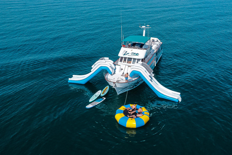 Boat Adventure: XXL Slides, Snorkeling, Activities, Lunch, and Pickup Boat Adventure: XXL Slides, Snorkeling, Activities, Lunch, and Pick-Up