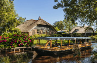 Ab Amsterdam: Tagestour nach Giethoorn & geführte Grachtenfahrt